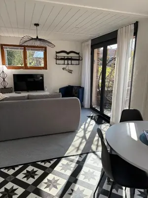 Coin salon dans l'établissement Gîtes Saint-Germain