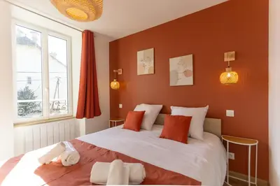 Un ou plusieurs lits dans un hébergement de l'établissement La Maison du Parc