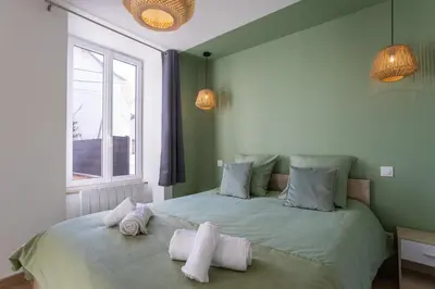 Un ou plusieurs lits dans un hébergement de l'établissement La Maison du Parc