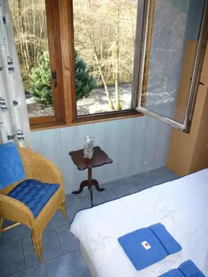 Un ou plusieurs lits dans un hébergement de l'établissement Chalet du Montal