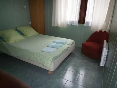 Un ou plusieurs lits dans un hébergement de l'établissement Chalet du Montal