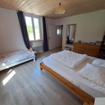 Un ou plusieurs lits dans un hébergement de l'établissement La Maison