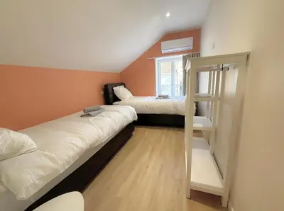 Un ou plusieurs lits dans un hébergement de l'établissement Grand duplex haut de gamme, 4pers, hyper centre, climatisation, stationnements à 10m , très calme