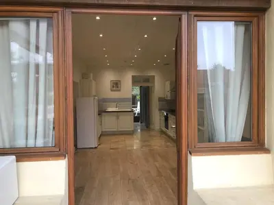 Cuisine ou kitchenette dans l'établissement Logement Montret