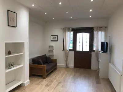 Télévision ou salle de divertissement dans l'établissement Logement Montret