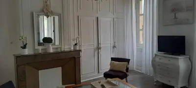 Télévision ou salle de divertissement dans l'établissement Gite le Soujet