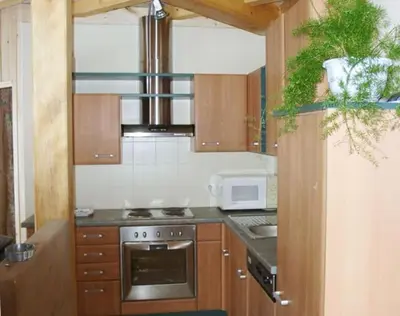 Cuisine ou kitchenette dans l'établissement Maison plain pied intérieur bois - Lac de chalain - Gîte les 4 saisons