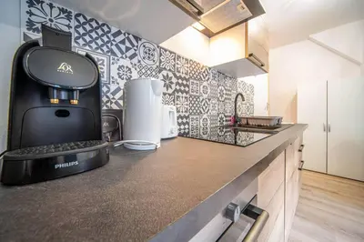 Cuisine ou kitchenette dans l'établissement Lumière aux Fèvres