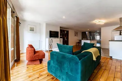 Cuisine ou kitchenette dans l'établissement Le Liberté Coeur de ville Duplex