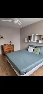 Un ou plusieurs lits dans un hébergement de l'établissement Maison Villa