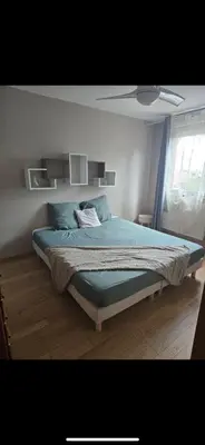 Un ou plusieurs lits dans un hébergement de l'établissement Maison Villa