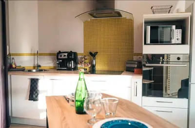 Cuisine ou kitchenette dans l'établissement Le Cosy