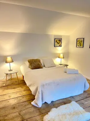 Un ou plusieurs lits dans un hébergement de l'établissement Domaine Paulette, Maison Blanche