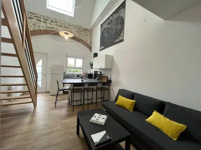 Coin salon dans l'établissement Appartement avec du cachet