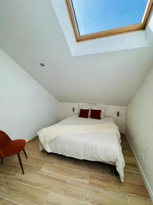 Un ou plusieurs lits dans un hébergement de l'établissement Superbe appartement beaune centre