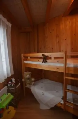 Un ou plusieurs lits dans un hébergement de l'établissement Gîte les 4 saisons - Intérieur bois - Lac de Chalain