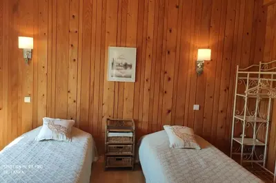 Un ou plusieurs lits dans un hébergement de l'établissement Gîte les 4 saisons - Intérieur bois - Lac de Chalain