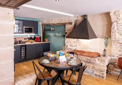 Cuisine ou kitchenette dans l'établissement La Forge - Clim - Jacuzzi - Hyper Centre
