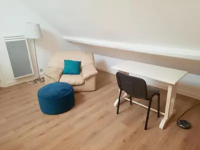 Coin salon dans l'établissement Legrand - 90m2, 6 Prs, 3 Ch, Proche Gare