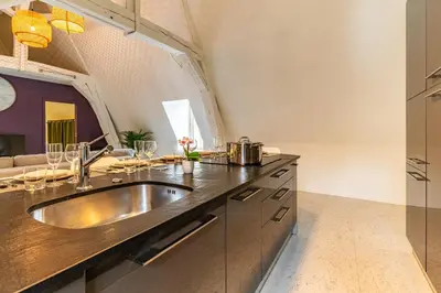 Cuisine ou kitchenette dans l'établissement Appart Cosy 6 Personnes - Parking Gratuit - Centre Ville Historique Dijon