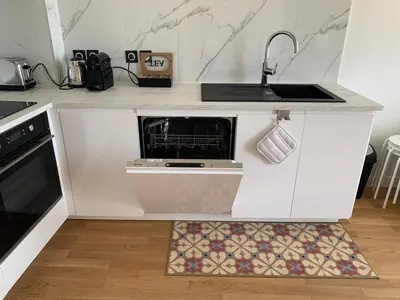 Cuisine ou kitchenette dans l'établissement Appartement neuf, vue sur saône