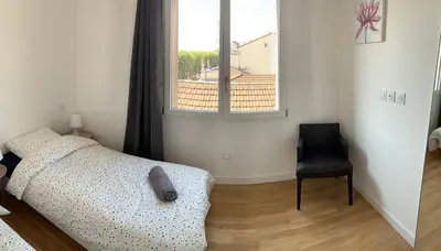 Un ou plusieurs lits dans un hébergement de l'établissement Appartement neuf, vue sur saône