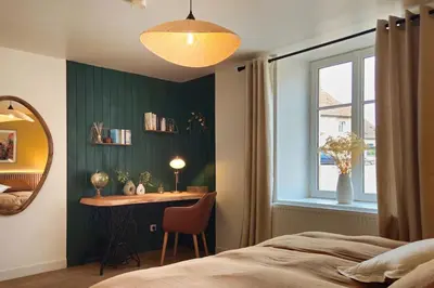 Un ou plusieurs lits dans un hébergement de l'établissement Gite romantique avec spa en Bourgogne
