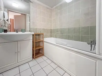 Salle de bains dans l'établissement Chez Marianne Résidence Piscine Sauna
