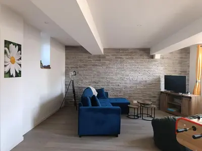 Télévision ou salle de divertissement dans l'établissement gîte des marguerites