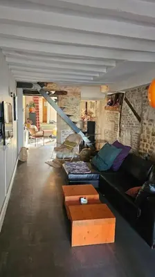 Coin salon dans l'établissement Maison de ville