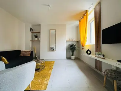 Télévision ou salle de divertissement dans l'établissement Loco Parc Duplex