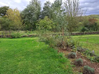 Jardin de l'établissement Charmante maison de caractère
