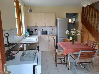 Cuisine ou kitchenette dans l'établissement Charmante maison de caractère