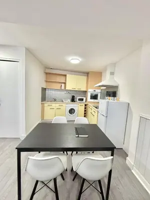 Cuisine ou kitchenette dans l'établissement appartement confort