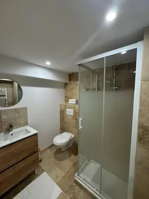 Salle de bains dans l'établissement Bel appartement rez-de-chaussée