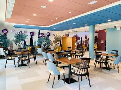 Restaurant ou autre lieu de restauration dans l'établissement DOMITYS - Le Bouquet