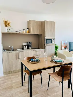 Cuisine ou kitchenette dans l'établissement DOMITYS - Le Bouquet