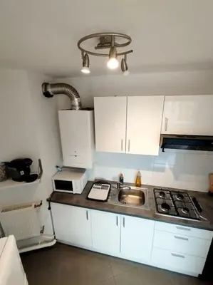 Cuisine ou kitchenette dans l'établissement Idéalement situé pour tous III