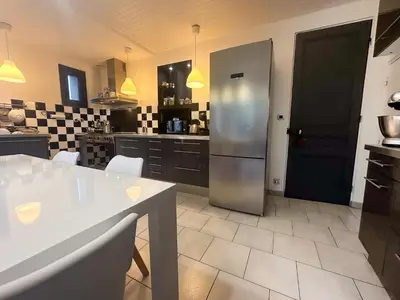 Cuisine ou kitchenette dans l'établissement Le clos de Laly