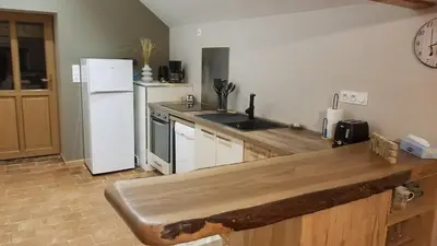 Cuisine ou kitchenette dans l'établissement Gîte du Ka'lao