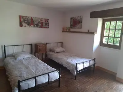 Un ou plusieurs lits dans un hébergement de l'établissement La Maison des Renouillers