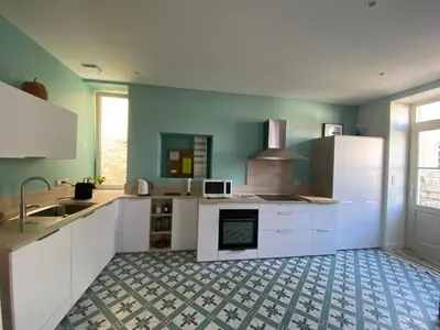Cuisine ou kitchenette dans l'établissement Aureahome