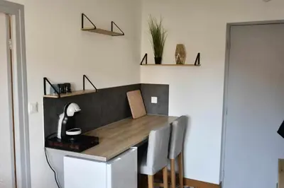 Cuisine ou kitchenette dans l'établissement Le cocon de Julia