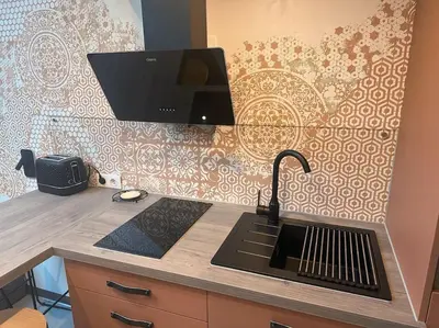 Cuisine ou kitchenette dans l'établissement La mezzanine
