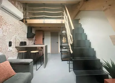 Coin salon dans l'établissement La mezzanine
