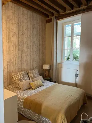 Un ou plusieurs lits dans un hébergement de l'établissement La Maison aux volets bleus 37 m3, Bords de Saône