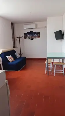 Coin salon dans l'établissement Bel Appartement Fonctionnel,2 grandes chambres separer plus un bz,WI FI,Clim