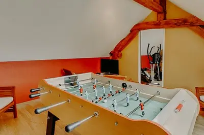 Salle de jeux dans l'établissement Maison Saunières