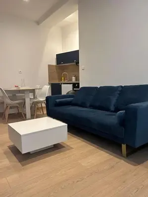 Coin salon dans l'établissement Appartement T2 - Chalon-sur-Saône