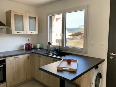 Cuisine ou kitchenette dans l'établissement Le gîte de la fontaine - le renard